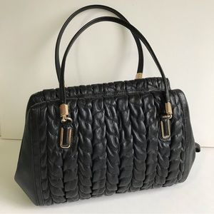 Office lady or mother used shoulder or carry on bag from coach